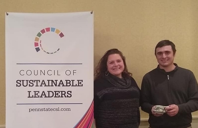 Pictured are Assistant Teaching Professor of Wildlife Technology Keely Roen with student Eli DePaulis at the awards ceremony where DePaulis received the John Roe Student Sustainability Award.  (Provided photo)