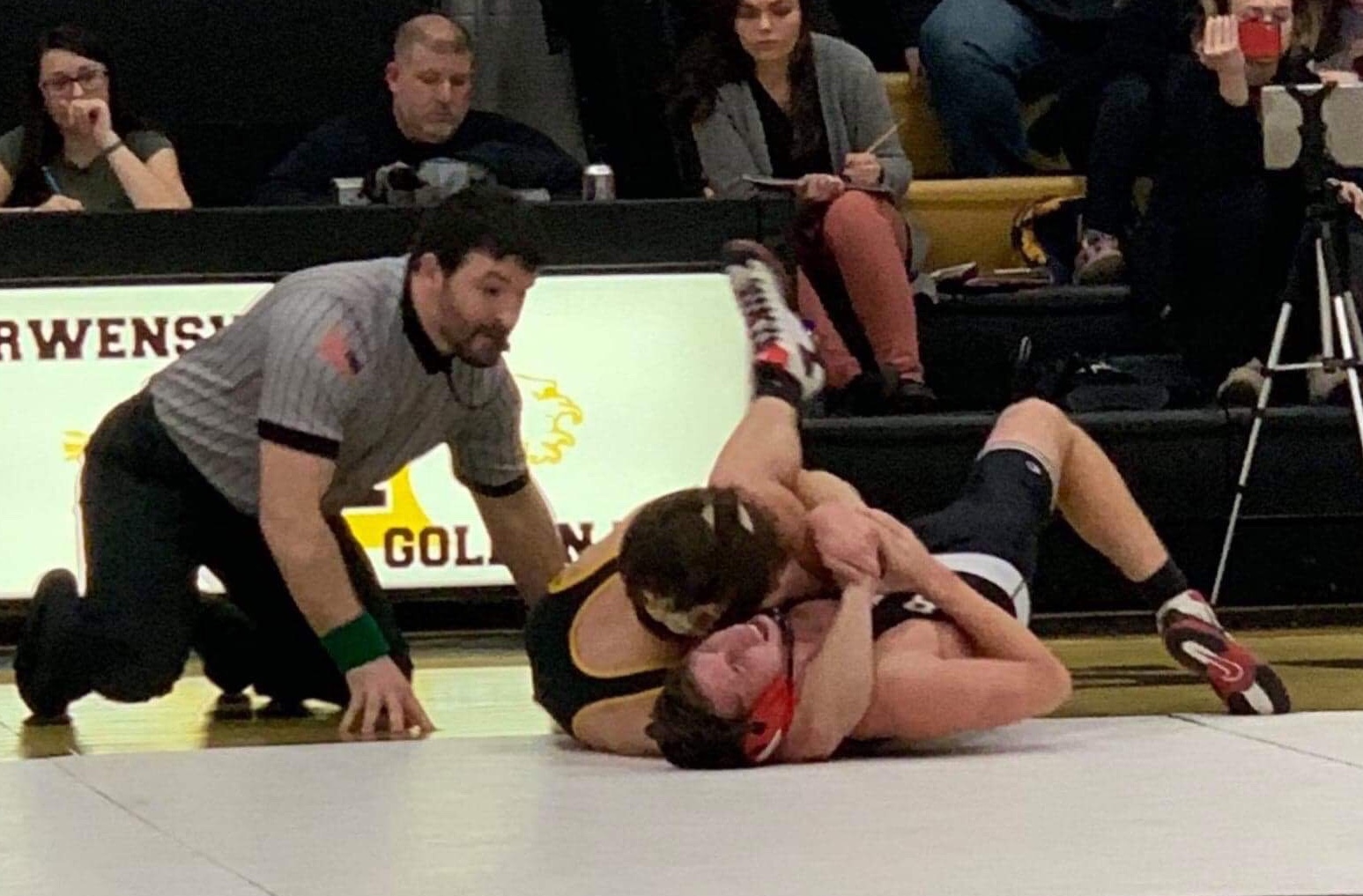 Zach Holland finished his undefeated regular season with a fall