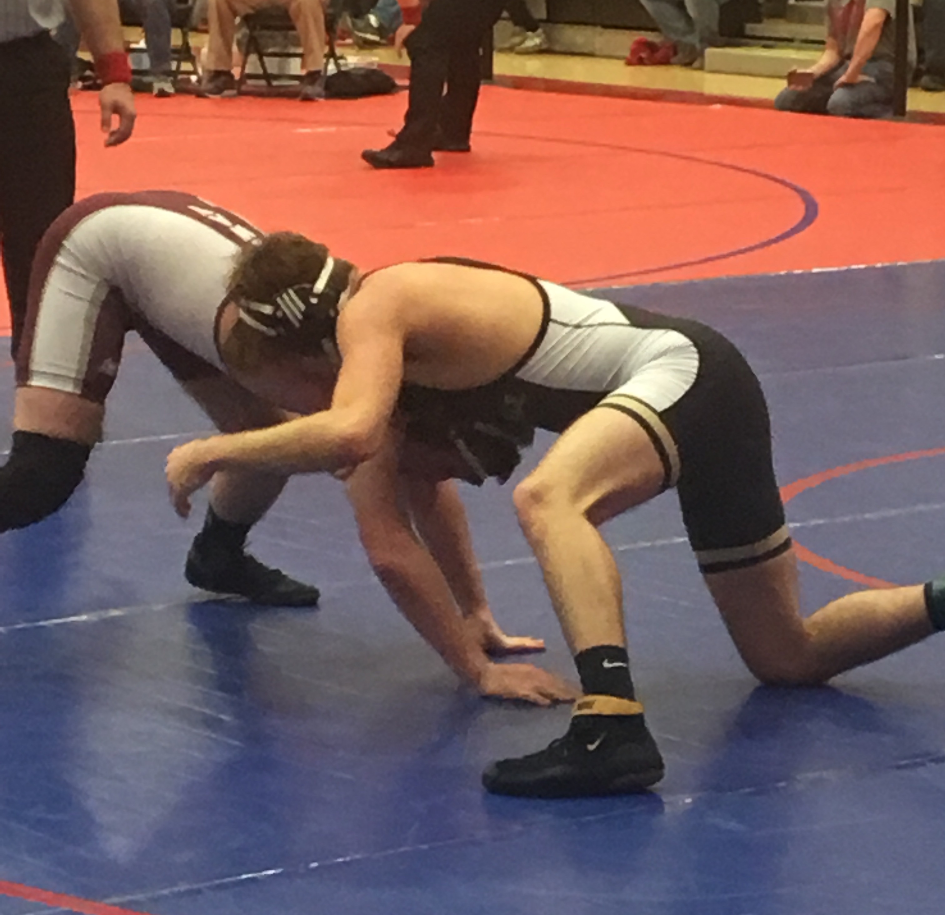 Jake McCracken looks for control in his quarterfinal bout (Photo by Jay Siegel)