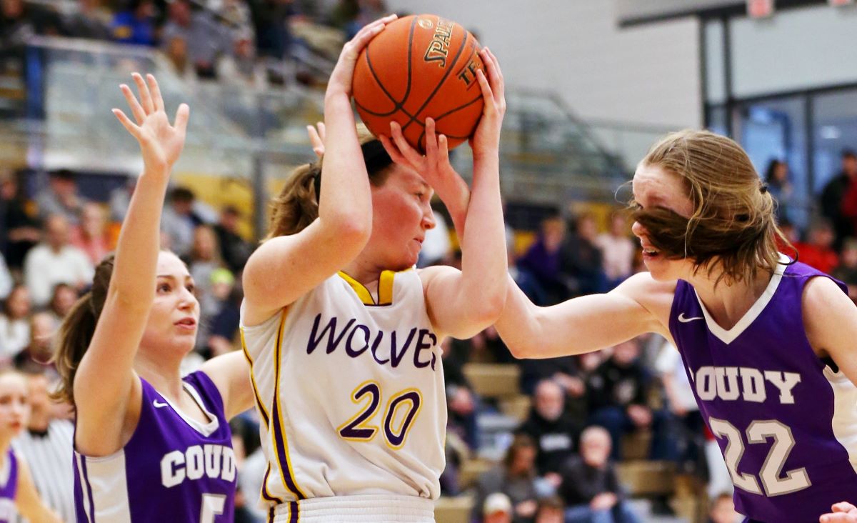 (Photo Coudersport’s Mikayla Gunn (left) and Sarah Chambers (right) along with North Clarion’s Abby Gatesman (center) were hoping to be able to play Saturday in the PIAA quarterfinals. That won’t happen for a minimum of two weeks now, if at all, after the PIAA made the decision to suspend the PIAA basketball and 2A swimming postseason due to the COVID-19 Coronavirus. Photo by Paul Burdick. Check out more of Burdick’s work here)