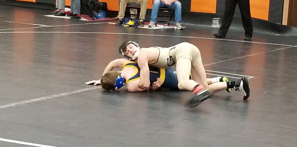 Jacob Carfley, here winning his first consy match, was 2-2 at regionals