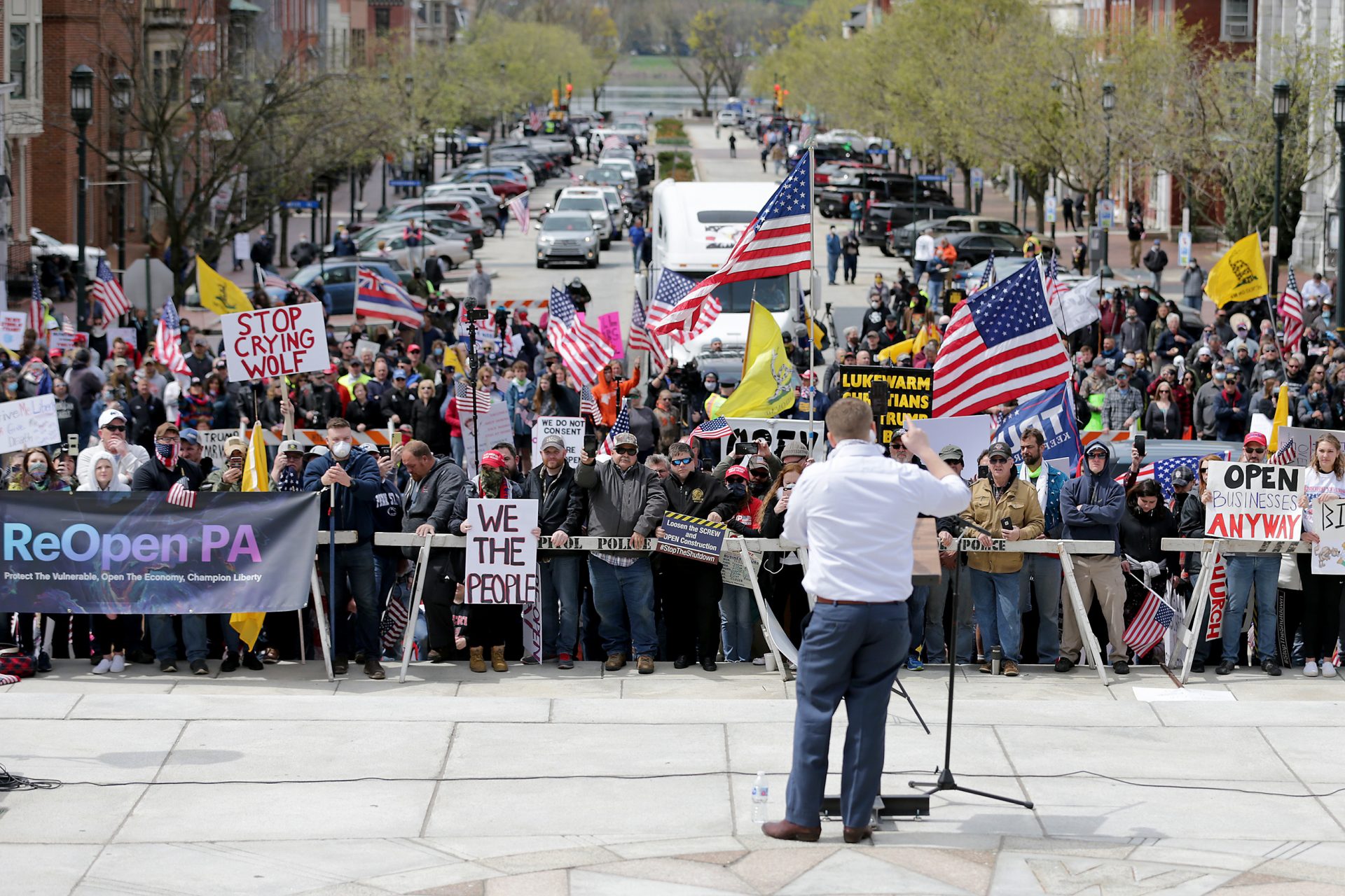 PA State Rep. Aaron Bernstine, foreground, joins protesters as they gather outside the Capital Complex in Harrisburg, PA on April 20, 2020. They are calling for Gov. Wolf to reopen up the state's economy during the coronavirus outbreak. Rep. Bernstine is supporting the reopening of businesses.

 DAVID MAIALETTI / Philadelphia Inquirer