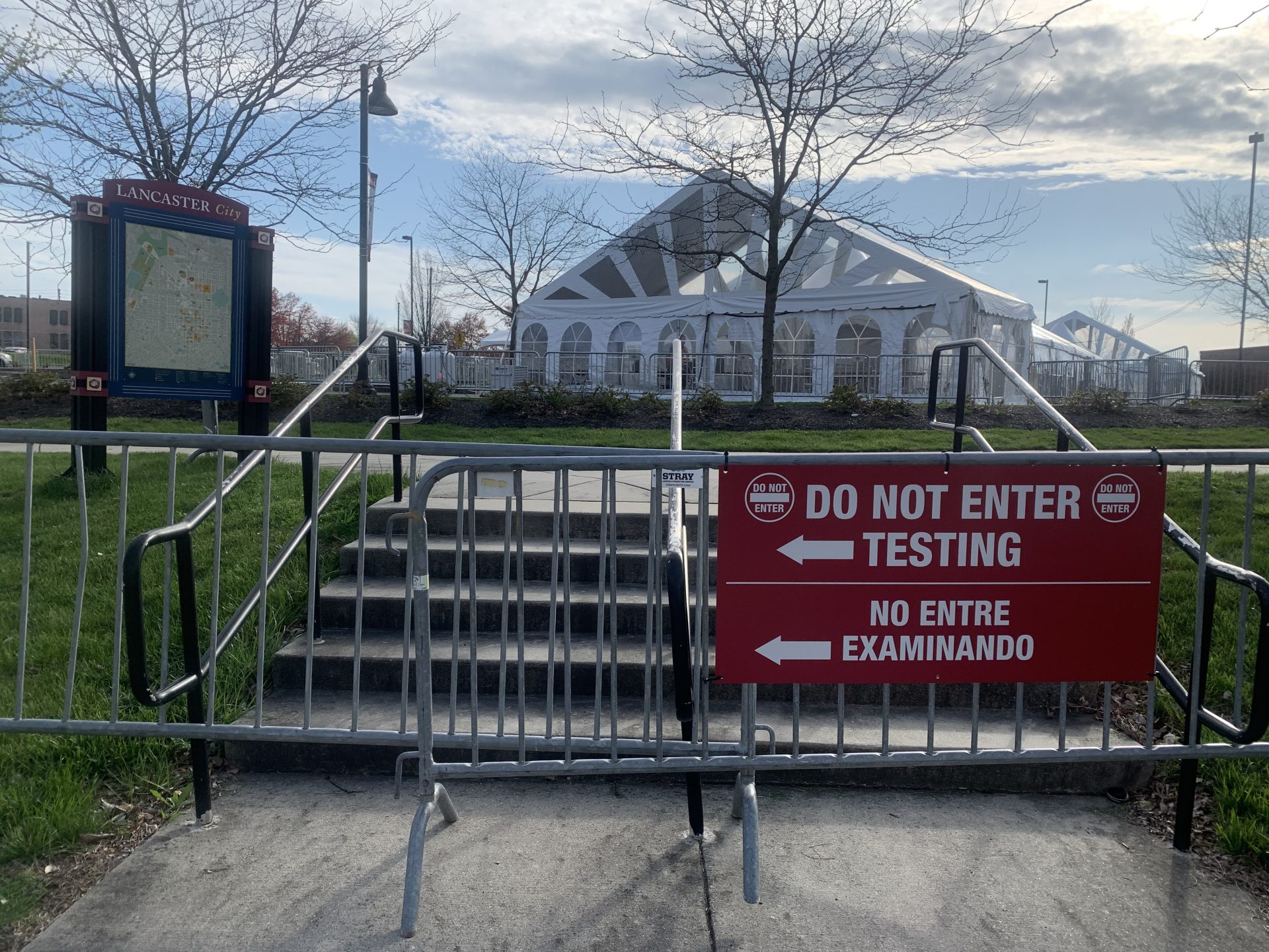 A sign blocks access to a portion of the parking lot outside Clipper Magazine Stadium in Lancaster, Pa., on April 7, 2020. A coronavirus testing center will operate out of several tents erected in the stadium parking lot.

Russ Walker / PA Post