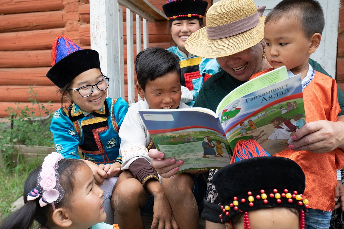 In Mongolia, boys and girls from the unreached Buryat people group listen to a teacher of The Greatest Journey share a lesson from their student workbook. (Photo is courtesy of Samaritan’s Purse).