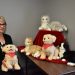 Kathleen Gillespie, CEO of CCAAA, with robotic pets available to provide companionship for older adults in need. (Provided photo)