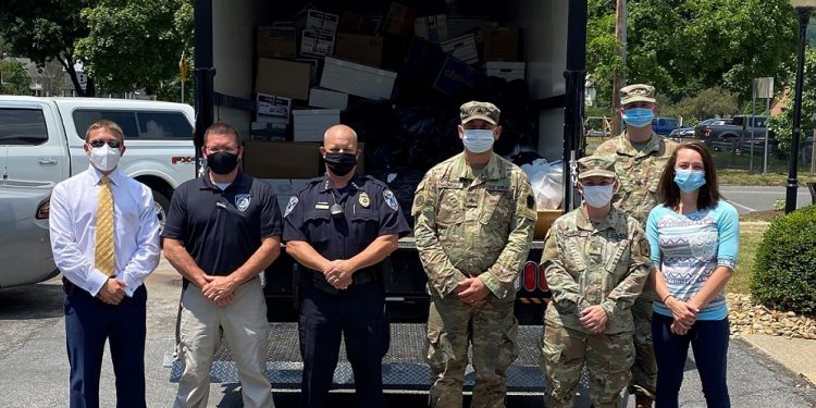 Pictured, from left to right, are:  Ryan P. Sayers, Clearfield County district attorney; Chief Kris Kruzelak of Sandy Township Police Department; Chief Vincent McGinnis of Clearfield Borough Police Department; Sgt Madrigale, Sgt Hayes and Sgt Maguire of the PA Army National Guard; and Jamie Long of the Clearfield-Jefferson Drug and Alcohol Commission. (Provided photo)