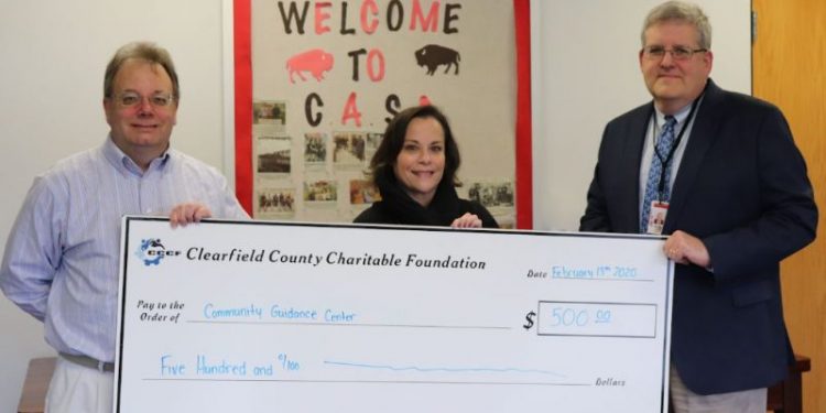 Pictured is CCCF Executive Director Mark McCracken presenting 2019 CCCF grant award to Sherry Skidmore from Community Guidance Center and CASD Superintendent Terry Struble for the Bison Outreach Project. (Provided photo)