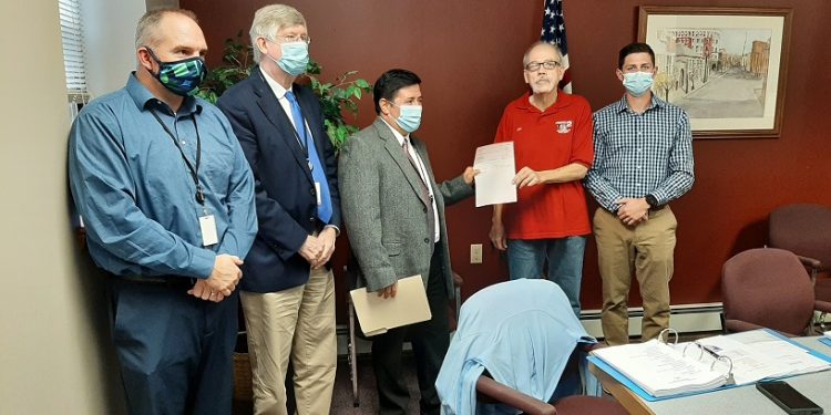 The Clearfield County Commissioners on Thursday presented CARES Funding to Clearfield Borough Council. Pictured, from left to right, are: Commissioners Dave Glass, John Sobel and Tony Scotto with Mayor Jim Schell and Councilman Robbie Tubbs. (Photo by Wendy Brion)