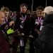 Ridgway head coach Mark Heindl (left) receives the D9 Class 2A championship plaque from D9 tournament chairman Bob Tonkin after winning last year's title. D9 released its playoff plan Wednesday.