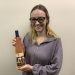 Big Brothers Big Sisters of Jefferson, Elk, and McKean Counties Case Manager, Lacy Reed displays a bottle of Wilcox Winery’s new wine, “Fearless.”  (Provided photo)