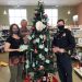 Pictured from left, Ronda Vaughn, fundraising & events specialist for the CCAAA, Darla Smay of Clearfield Pharmacy & Gift Shoppe, and Clearfield Borough Assistant Chief of Police Nathan Curry. (Provided photo)