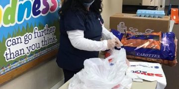 Linda Swatsworth of Clearfield’s Salvation Army has been named a “Hometown Hero” for her work with the organization. Here she sorts food from the Pennsylvania Food Bank for their food pantry. (provided photo)