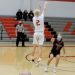 Matt Pallo (2) hangs in the air following his three-point bucket in the third quarter.