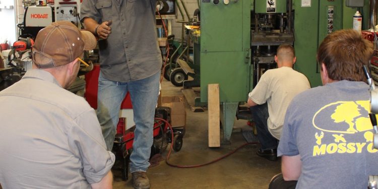 Students receive hands-on instruction on the shop floor in a past Penn State DuBois die setter training class. (Provided photo)