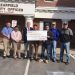 Pictured, from left to right, are: Commissioners Dave Glass, Tony Scotto, John Sobel, board chairman; Pat Domico, Squirrel Tails for Trout coordinator; and Tim Opaliski, Rich Jenny and Rich Terry, all of Walmart Distribution Center, Woodland. (Photo by GANT News Editor Jessica Shirey)