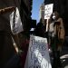 Michelle Perry of Philadelphia protested outside Gov. Tom Wolf's Center City office earlier this month, demanding "a working unemployment system to provide timely responses and benefits to unemployed workers."

DAVID MAIALETTI / Philadelphia Inquirer