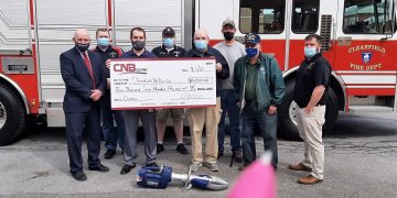 Pictured, from left, are: Dustin Minarchick, CNB regional president; Andrew Smith, deputy fire chief; Tyler Kirkwood, CNB AVP commercial branch manager; Brett Collins, assistant fire chief; Gary Shugarts, fire company treasurer; Jim Spencer, president of AFSCME Local No. 302; Don Shaw and Justin Hainsey, secretary of Clearfield Fraternal Order of Eagles No. 812. (Photo by Wendy Brion)