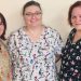 April’s “Hometown Hero” Patricia Anderson, middle, poses with her co-workers at Windy Hill Village in Philipsburg, Harley Steiner, left and Jayne Klanish, right, who nominated her for the honor. (Provided photo)