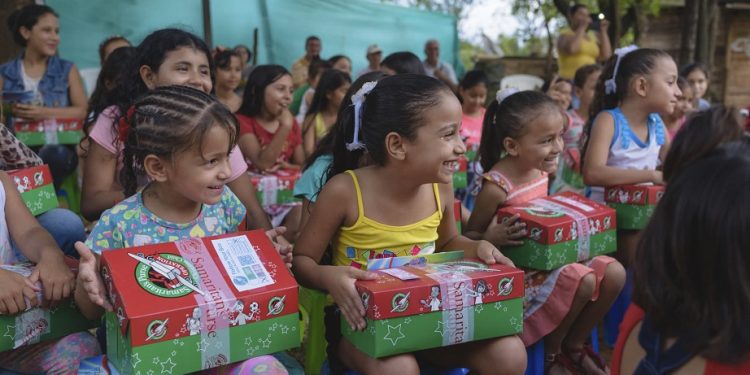 Children in Colombia eagerly await opening their shoebox gifts at the end of a countdown. (Photo is courtesy of Samaritan’s Purse)