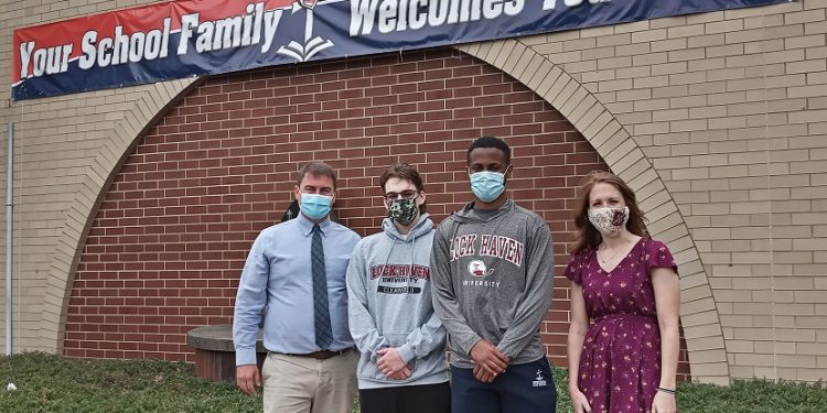 Shown are LHU alumni Andrew (left end) and Lauren Rice (right end) and incoming LHU freshmen Derek Strouse (middle left - nursing, Clearfield campus) and Loren Way (middle right - health and physical education, Lock Haven campus) outside of DuBois Central Catholic, where Strouse and Way are seniors and Andrew (08) and Lauren (07) teach. Now DuBois Central Catholic students will be able to enroll in LHU courses as part of the university's dual enrollment program.  (Provided photo)