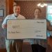 Josh Kunkle, Clearfield Walmart store manager (left) awards REST Inc. Founder Bobbie Johnson (right), a Local Community Grant in support of the REST Comfort Box program. (Provided photo)