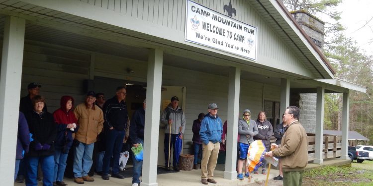 Galen Kilmer (right) welcomes the tour group to Camp Mountain Run. (Provided photo)