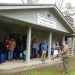 Galen Kilmer (right) welcomes the tour group to Camp Mountain Run. (Provided photo)