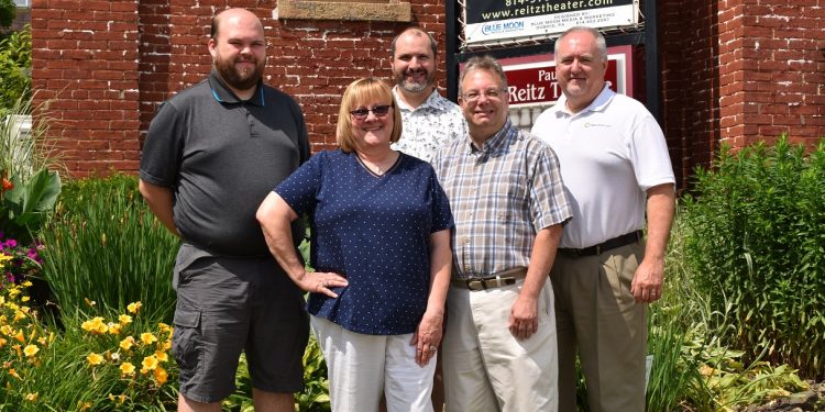 In the back, from left, are: Justin Salada, CRI board member; Joe Sensor, past president/CRI; and Chuck Johnson, CRI board member.   In the front are: Judy Smith, CRI board member/treasurer and Mark McCracken, CCCF executive director. (Provided photo)