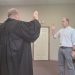 Brian Lytle is sworn in by Magisterial District Judge Michael Morris into the Clearfield Borough Council.  This is his second stint with the Council.