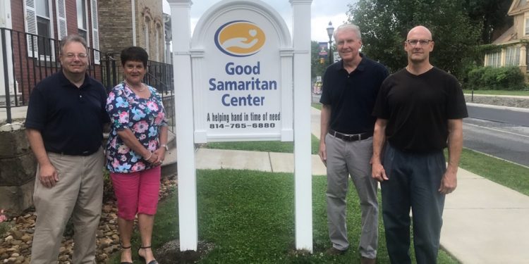 The Clearfield County Charitable Foundation awarded grant funding in 2020 to the Good Samaritan Center in Clearfield for a new sign in front of their Men’s Shelter.   
Pictured are CCCF Executive Director Mark McCracken, Good Samaritan Board Chair Michelle Fannin, Good Samaritan Center Chief Executive Officer Douglas K. Bloom and Good Samaritan Board Member Brent Thomas.  (Provided photo)