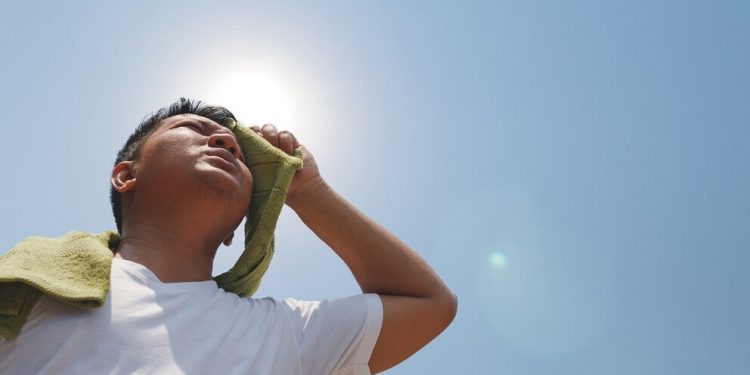 Young man and heat stroke.