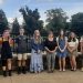 Middle and High School Poetry Contest winners are pictured, from left to right:  Alastor Tornatore, Emily McTavish, Brennan Michael, Lillian Neff, Library Director Lisa Coval, Jaycee Wood, Abigail Simcox and Cole Spencer. (Provided photo)