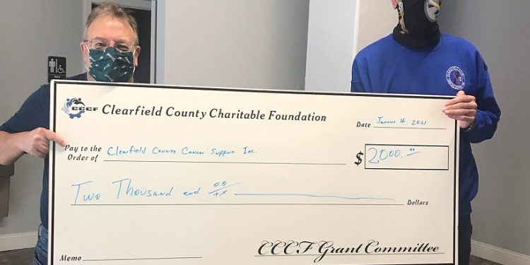 In January, Charitable Foundation Executive Director Mark McCracken presented Mike Greene, president/chief executive officer of Clearfield County Cancer Support Inc. a grant for $2,000.   
The funding was used by Cancer Support to help people undergoing cancer treatments meet their monthly financial obligations.   
Greene said: “the funding received from CCCF allows us to help cancer patients so they can concentrate on getting better and won’t have to worry about daily household expenses.”
(Provided photo)