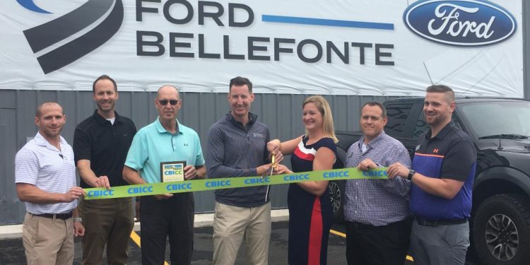 Matt and Tiffany Stuckey cut the CBICC ribbon at their newest location, Stuckey Bellefonte Ford (2892 Benner Pike, Bellefonte, PA 16823), while surrounded by Stuckey employees and Vern Squier, CBICC President & CEO.
