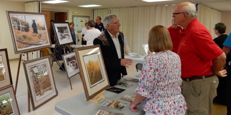 Ken Hunter chats with guests before the DuBois Area Historical Society's dinner.