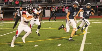 Mark McGonigal, here running against P-O from earlier in the season, and the seniors on the Bison squad saw their season come to a close against Bedford.
