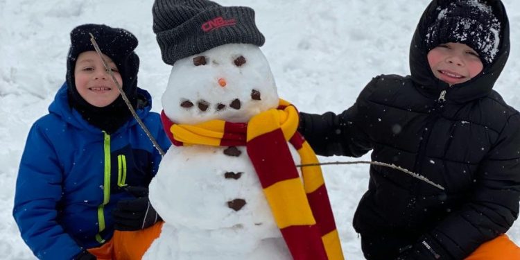 Picture here, with their snowman, are Jake and Wyatt Green of Clearfield. (Provided photo)