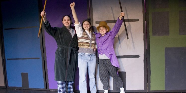 "Hold on tight. This is it! Here we go!"  Willy Wonka, Charlie Bucket, and Grandpa Joe take flight in the Wonkavator and soar into the sky high above the chocolate factory.  
Jorja Fleming, Alaina Anderson, and Maizy Hoover rehearse a scene from Curwensville Area High School's production of the beloved musical "Roald Dahl's Willy Wonka" to be presented on March 3, 4, and 5 at 7:30 p.m. each night.  
A special Sensory Friendly performance will also take place on March 5 at 1:30 p.m.  Join the cast for a visit into Willy Wonka's factory where magic lives, imagination abounds, and everything is edible.  
Tickets are available at the door for $8.00 each and sales begin at 6:30 p.m.