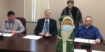 Pictured in front, from left, are Clearfield County Commissioners Tony Scotto, John Sobel and Dave Glass with Hoodie Hoo. In the back is Jane Lee Yare. (Photo by GANT News Editor Jessica Shirey)