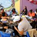 Students from Mastery Charter School-Pickett Campus in Philadelphia decorate their graduation caps June 13, 2018.

Mark Stehle / AP Photo