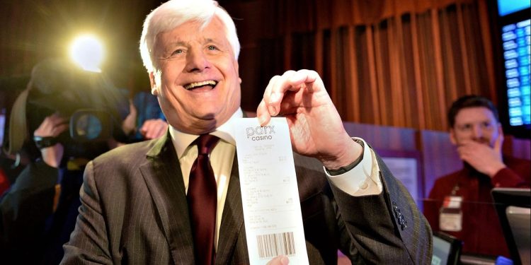 State Sen. Tommy Tomlinson (R., Bucks) is shown here holding a sports betting ticket at Parx Casino. Tomlinson’s office asked lobbyists for the casino to write language for a bill to ban skill games.

KIM WEIMER / BUCKS COUNTY COURIER TIMES