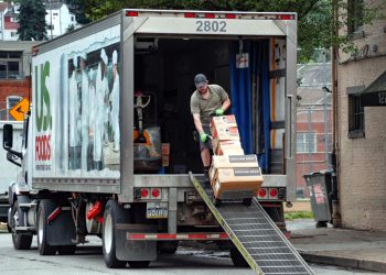 A food truck driver wheels a cart full of products for delivery to an establishment June 5, 2020, in Pittsburgh's Southside.

Keith Srakocic / AP photo