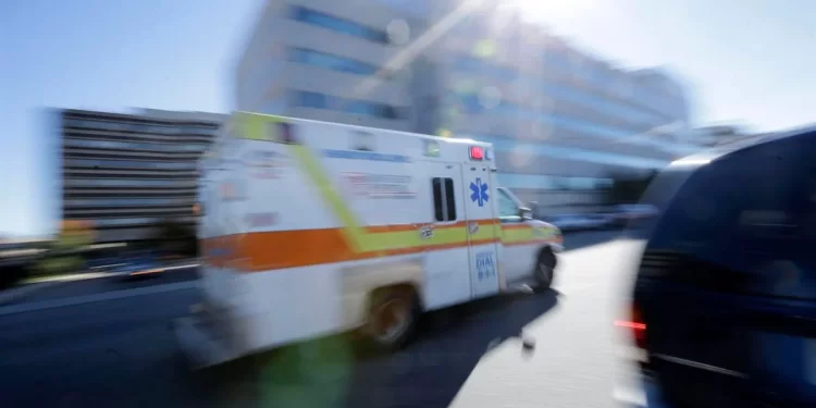 An ambulance drives near a hospital

AP Photo/Mel Evans