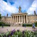 Students and adults walk in front of the Old Main building on the campus of Penn State University, in State College, Pa.

Kristopher Kettner | Shutterstock.com