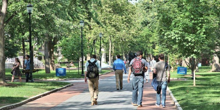 Students walk on the campus of Penn State University

Tupungato | Shutterstock.com