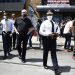 Philadelphia Police Commissioner Danielle Outlaw, center, and Mayor Jim Kenney, fourth from left, meet with people, Thursday, June 4, 2020, in Philadelphia after days of protest over the May 25 death of George Floyd, who died after being restrained by police in Minneapolis. 

Matt Rourke / AP Photo