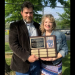 Gordon and Valerie Beers are pictured with the plaque that will be on display at the Clearfield County Career and Technology Center listing the recipients of the Scott Beers Memorial Scholarship.   In May, the names of the 2022 recipients, Erik Conaway, Abigail Depto, Alex Leskovansky and Adriyanna Dale were added to the plaque.