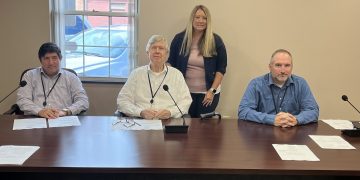 The Clearfield County Commissioners on Tuesday proclaimed September as Suicide Prevention & Awareness Month and Sept. 11 as Suicide Prevention & Awareness Day in Clearfield County. Pictured, from left to right, are: Commissioners Tony Scotto, John A. Sobel and Dave Glass. In the back is Windy Lopez of the Clearfield-Jefferson Suicide Prevention Team. (Photo by GANT News Editor Jessica Shirey)