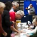 A voter steps from the voting booth Nov. 6, 2018, after casting his ballot in Doylestown, Penn.