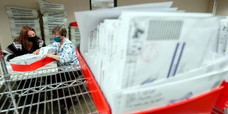 Lehigh County workers count ballots as vote counting in the general election continues Nov. 5, 2020, in Allentown, Pennsylvania.

Mary Altaffer / AP photo